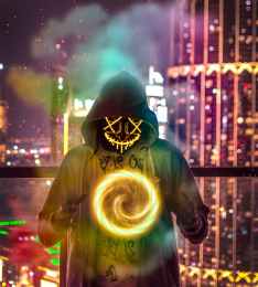 man wearing hoodie forming chakra wallpaper
